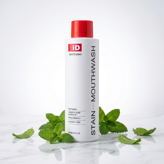 Whitening Stain Mouthwash bottle on marble surface